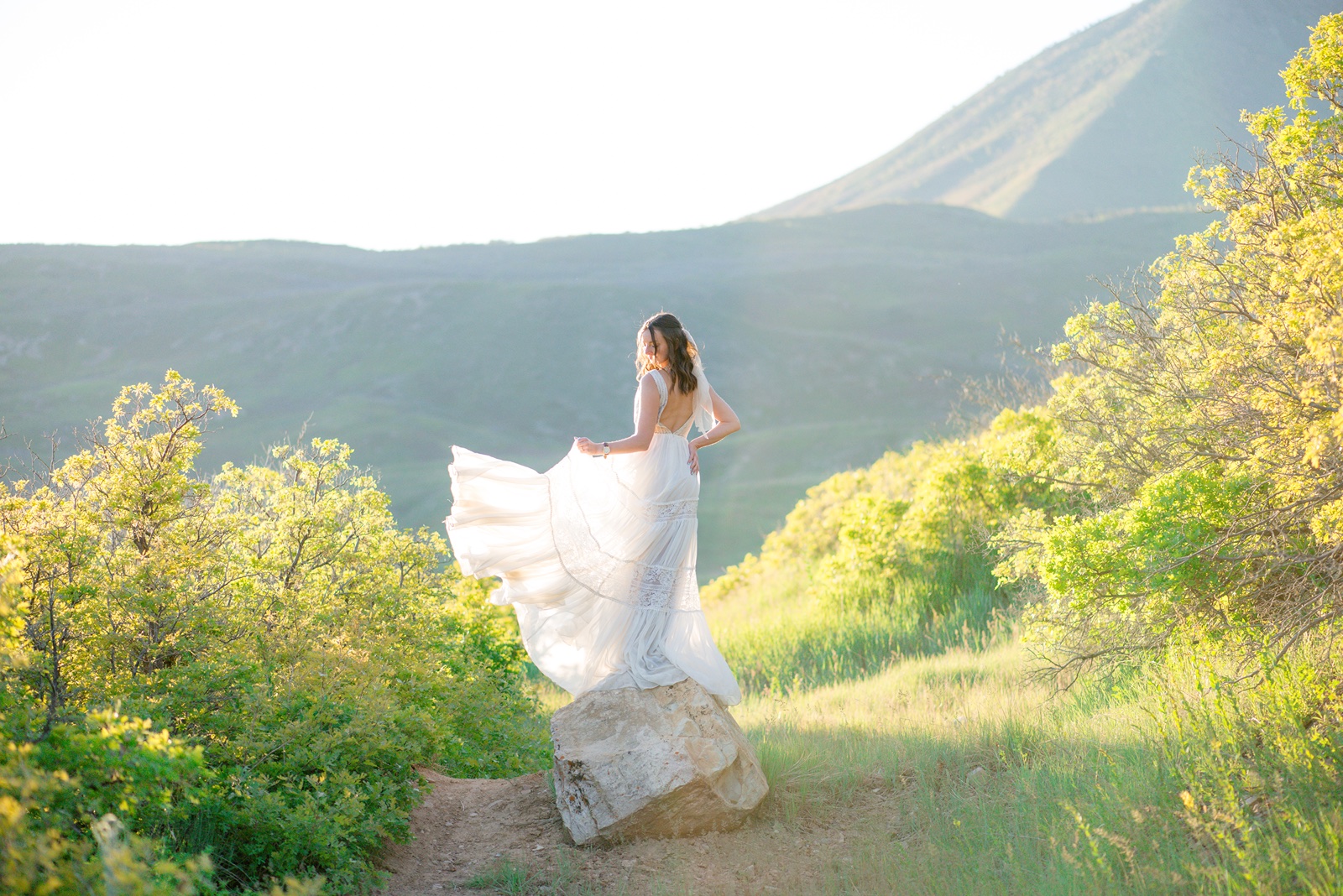 brides flowing dress in provo canyon bridal session in golden hour