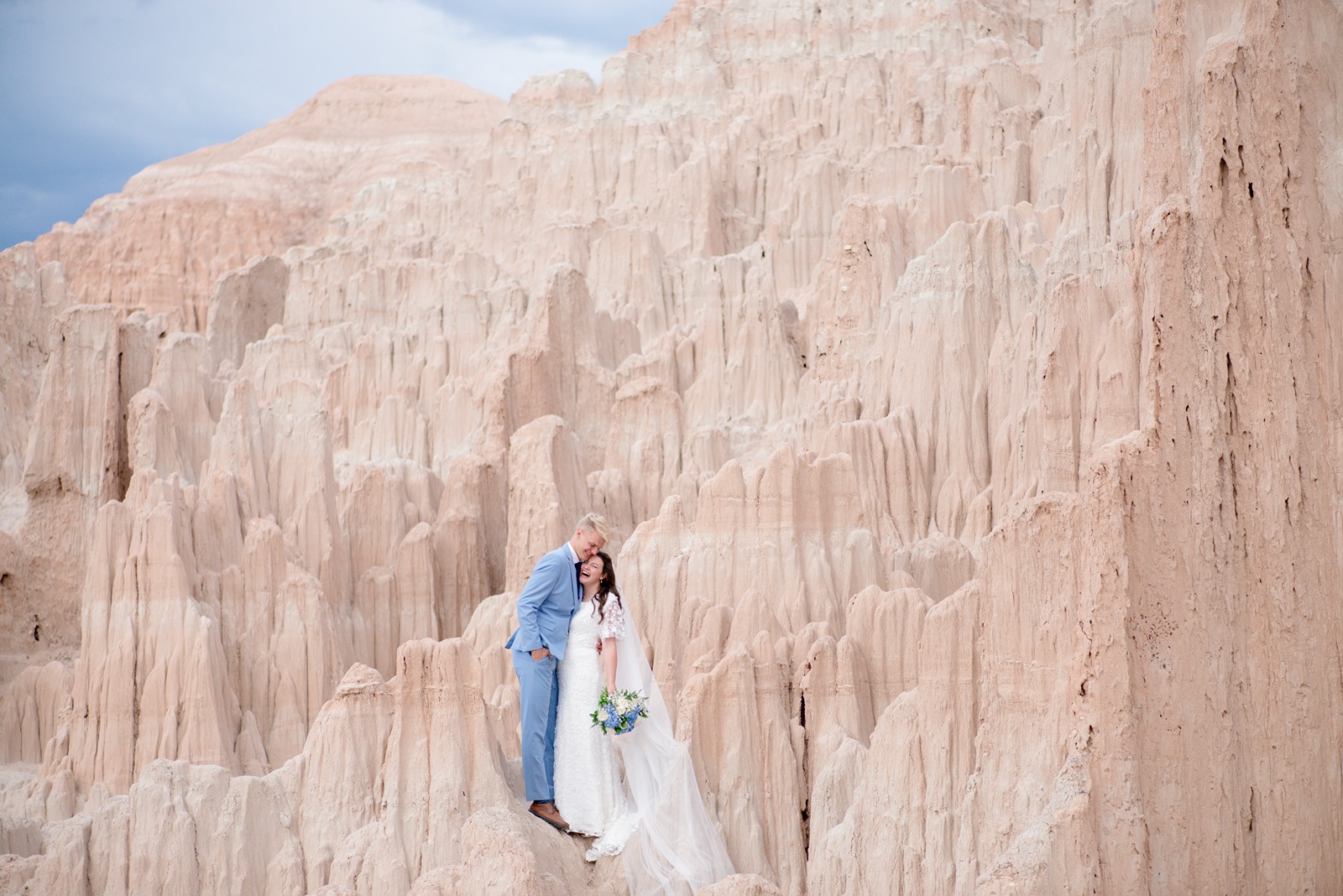happy bride and groom in southern utah desert wedding